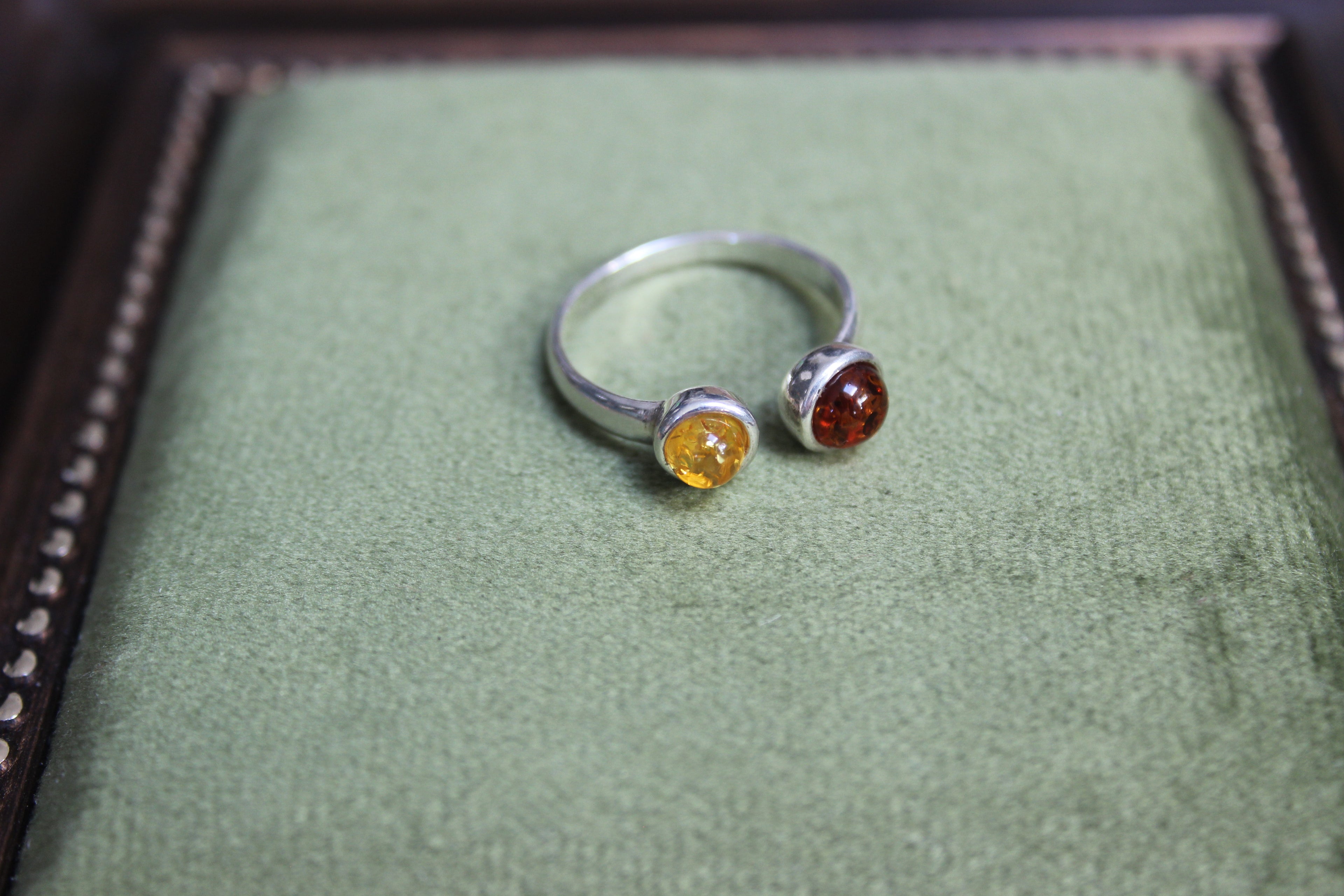 Silver Ring with Two-Tone Amber Balls