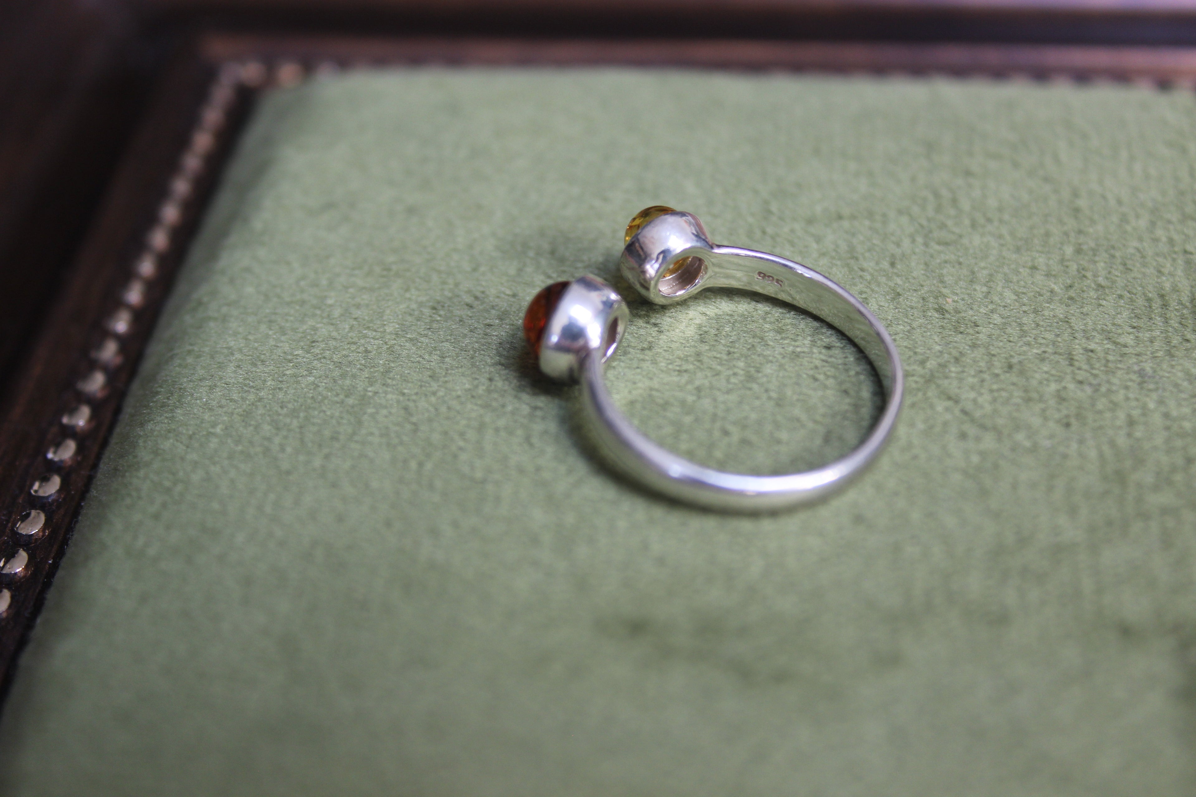 Silver Ring with Two-Tone Amber Balls