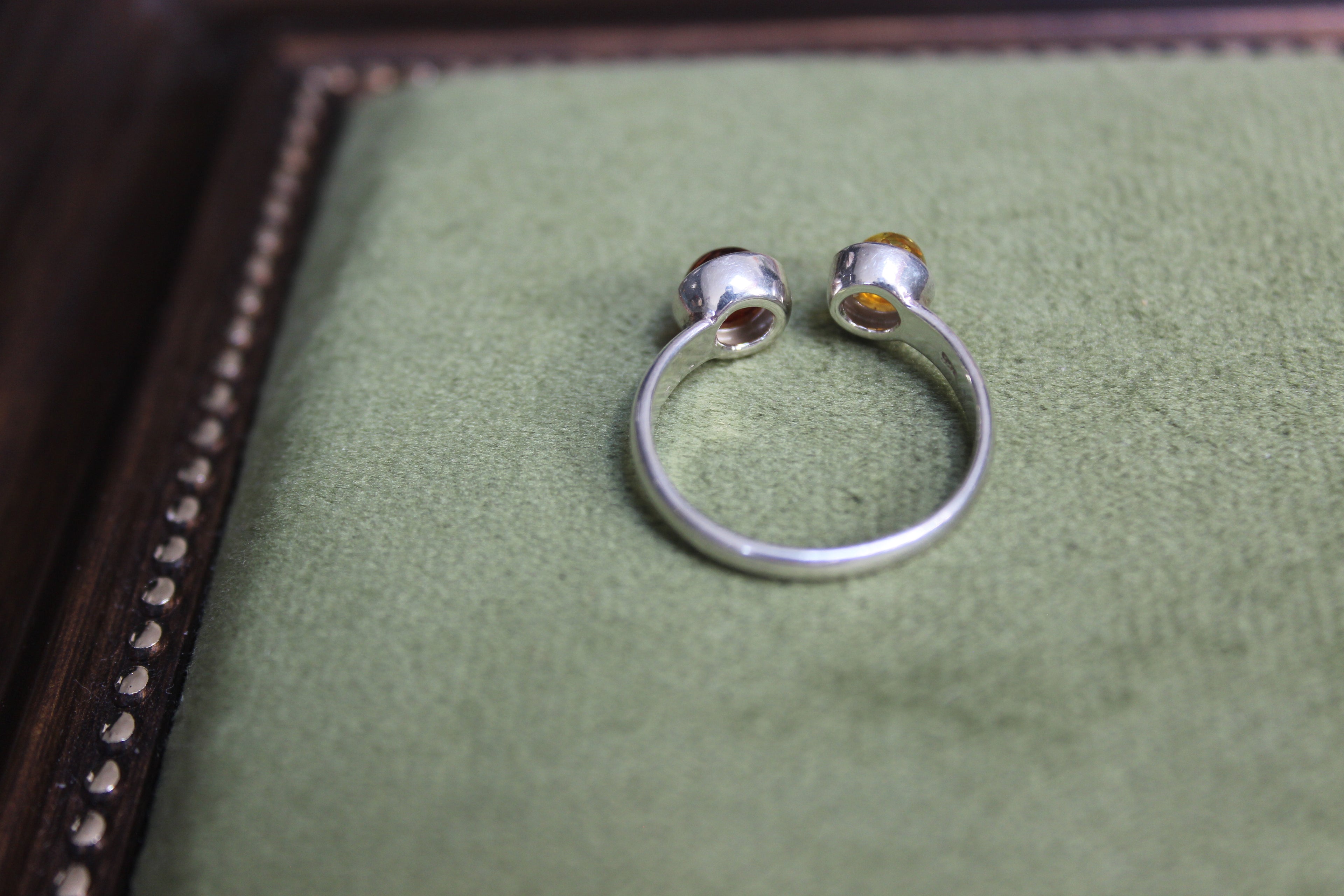 Silver Ring with Two-Tone Amber Balls