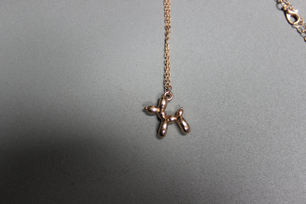 Balloon Dog Pendant Necklace – Gold Stainless Steel (close-up) – The Nook