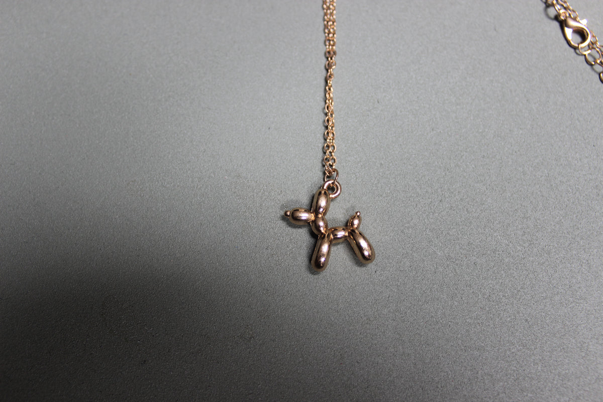 Balloon Dog Pendant Necklace – Gold Stainless Steel (close-up) – The Nook