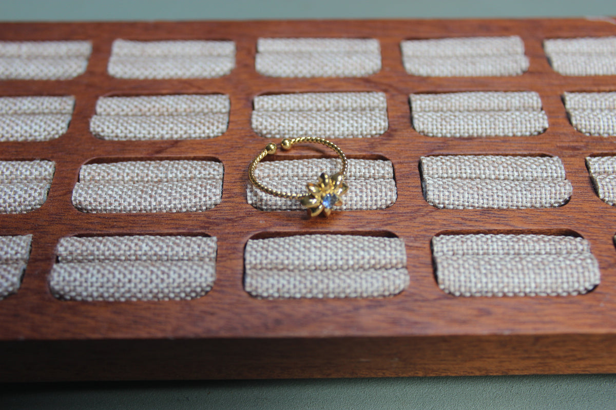 Gold Flower Ring with Blue Stone | Stainless Steel, Adjustable Size (close-up) – The Nook