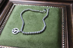 Vintage Tiffany & Co. Sterling Silver Bead Bracelet with Peace Sign Charm