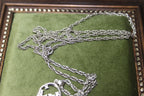 Sterling Silver Rope Chain Necklace with Floating Cubic Zirconia Circle Pendant