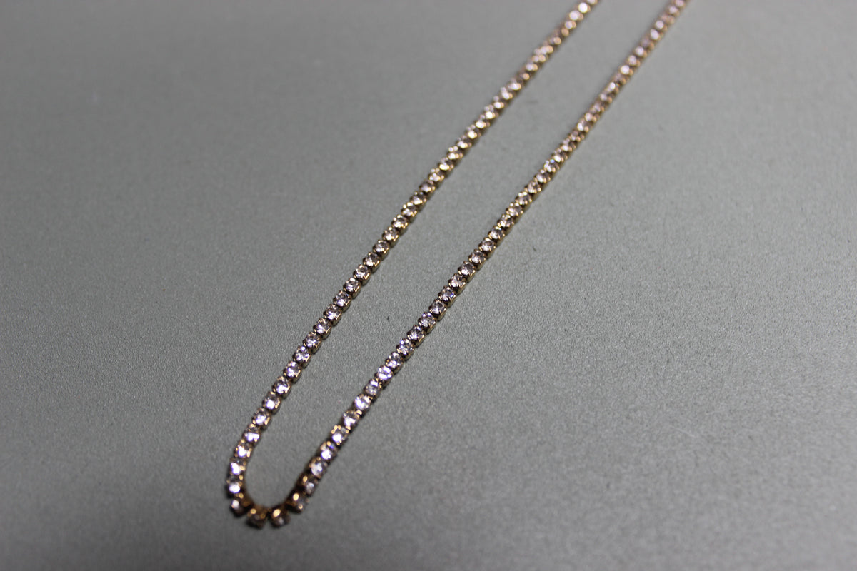 Dainty Gold Tennis Necklace (close-up) – The Nook
