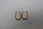 U-Shaped Gold Beaded Hoop Earrings (close-up) – The Nook